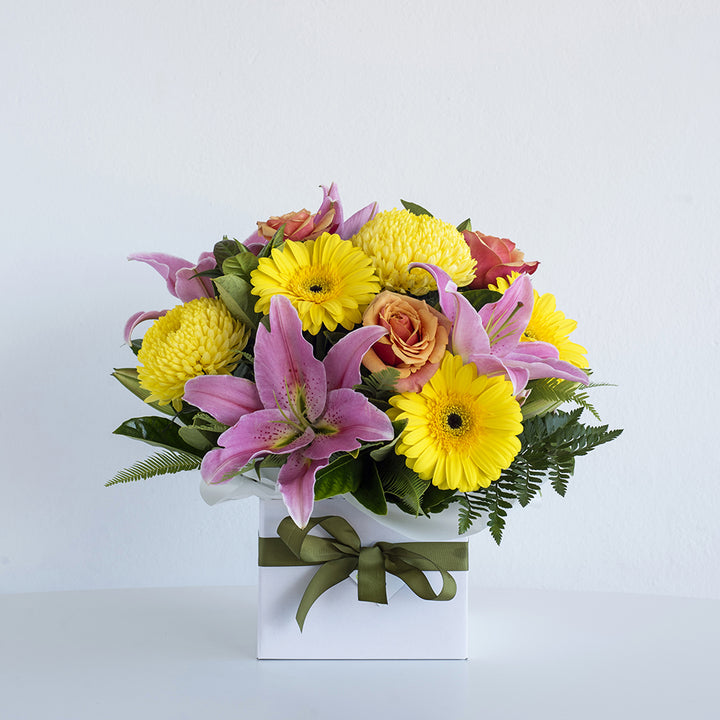 Yellow and Pink Box Arrangement by florist dubai