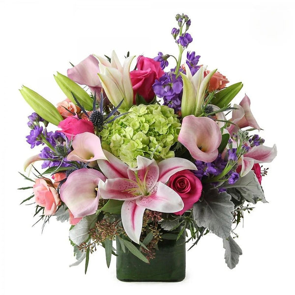 pink lilly and hydrangea arrangement
